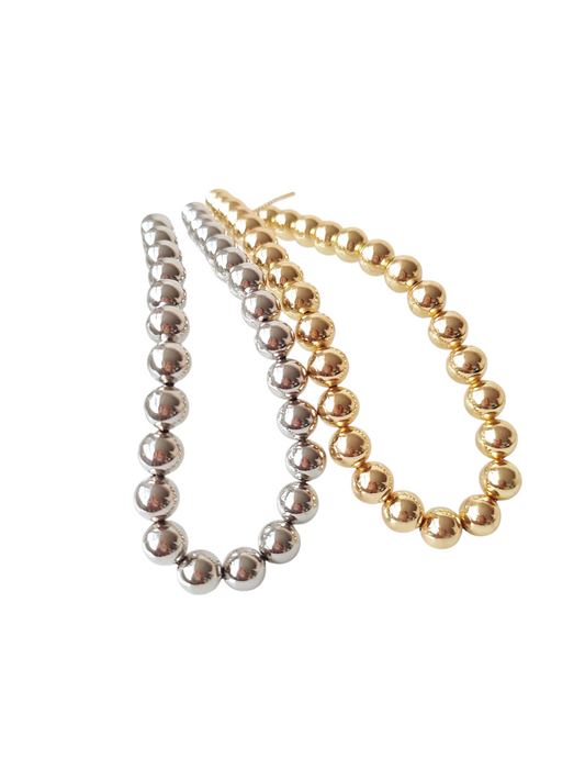 Chocker graduable de perlas dorada y plateada